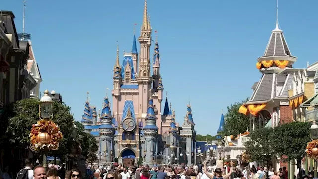 Unions at Disney World win 37% pay hikes in tentative labor deal | CNN Business