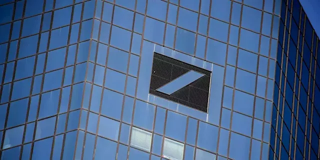 Deutsche Bank drops, weighing on banking stocks and Scholastic tumbles on disappointing results