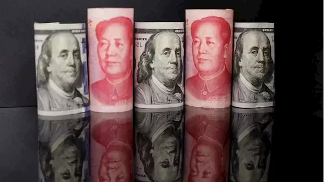 Analysis:Chinese companies hang onto dollars, hedge to prepare for volatile yuan