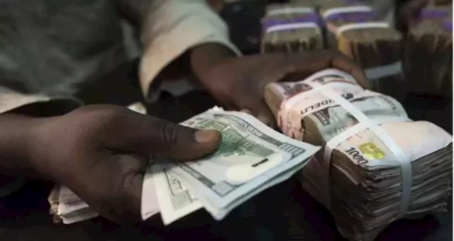 Naira records marginal gain at official market