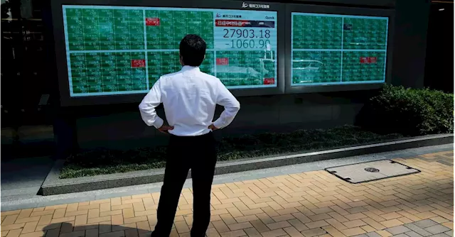 Asian stocks tumble after hawkish Powell comments