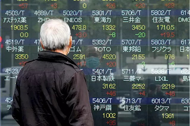 Asian stocks follow Wall Street down after US recession warning | Joe Mcdonald / AP Business Writer