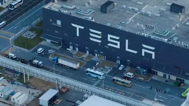 Social media protest erupts over 'unfair' bonus cuts at Tesla's Shanghai factory | CNN Business