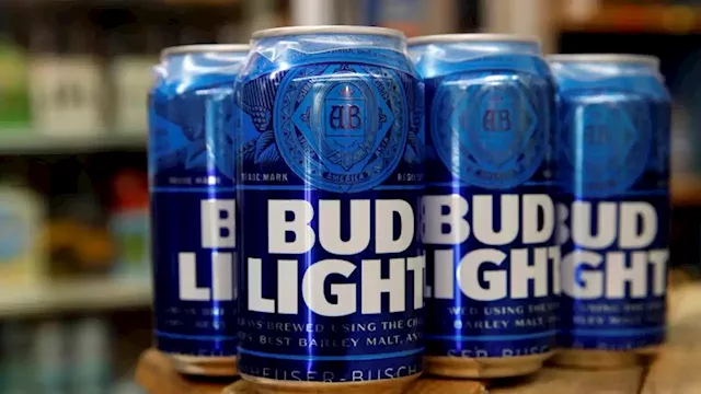 Bud Light owner places two execs on leave after transgender influencer backlash | CNN Business