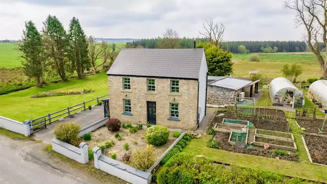 This traditional stone property with beautifully manicured gardens is on the market for €245,000 | IMAGE.ie