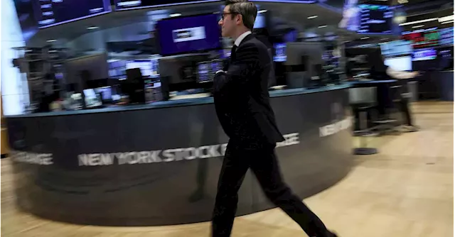 Wall St dips, dollar gains on mixed earnings, economic worries