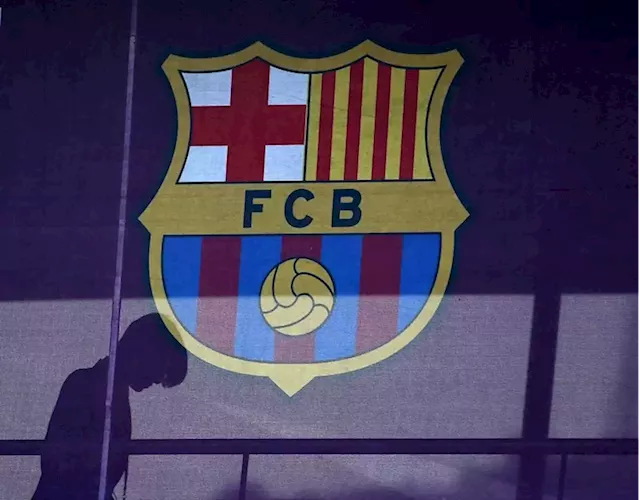 Soccer-Barcelona close $1.6 billion deal to finance stadium revamp