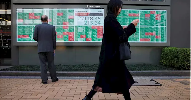 Asian stocks waver on China deflation worries, mixed Japan earnings