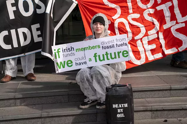 Extinction Rebellion hold 'die in' protest outside Dublin finance conference