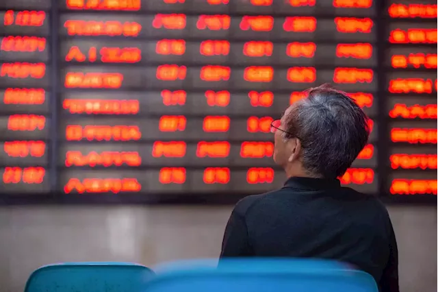 Sanctioned China stocks win sudden boost from patriotic buyers