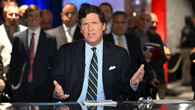 Justice Department opens criminal hacking probe into leaked Tucker Carlson videos | CNN Business