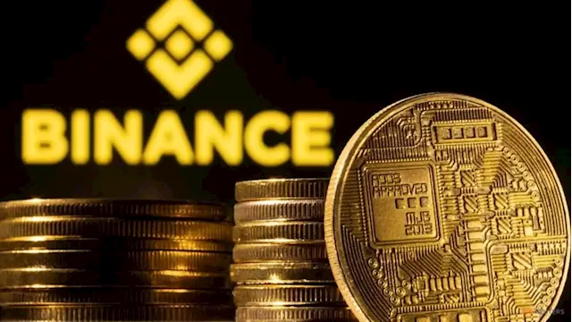 Crypto stocks fall after Binance halts bitcoin withdrawals for hours