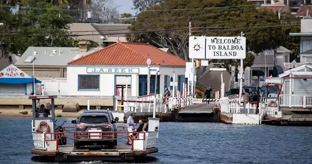 Column: In Newport Beach, an old ferry company navigates choppy waters toward zero emissions