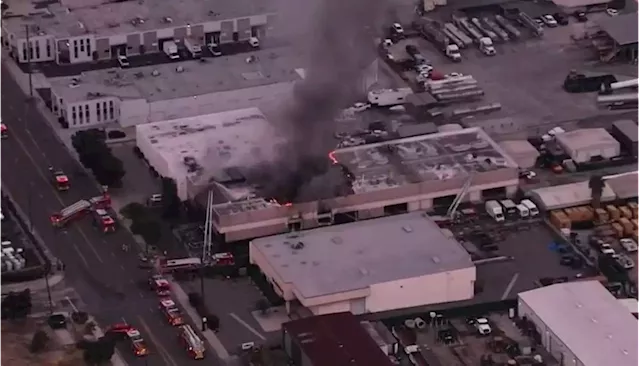 Firefighters Battle Flames at Signal Hill Heating and Cooling Parts Business