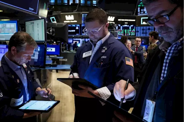 US stocks end mixed after Fed signals more rate hikes to come