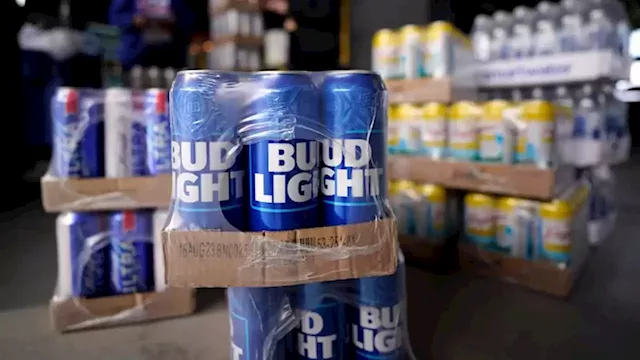 Anheuser-Busch is writing checks to distributors as Bud Light sales sink | CNN Business