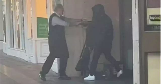 Business owner wrestles with armed man attempting to steal from jewellery store