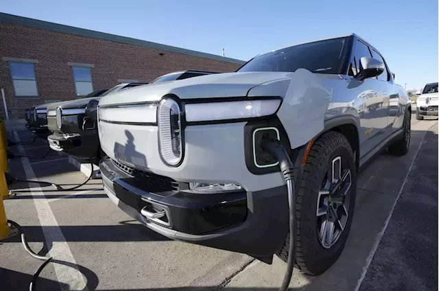 Tesla technology inches closer to becoming industry standard as Rivian joins its charging network