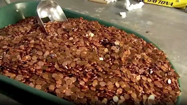 Autoshop owner who dumped 500 pounds of oily pennies on ex-employee's driveway is ordered to pay additional back wages | CNN Business