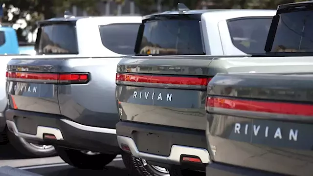 Rivian joins Ford and GM in turning to Tesla chargers | CNN Business