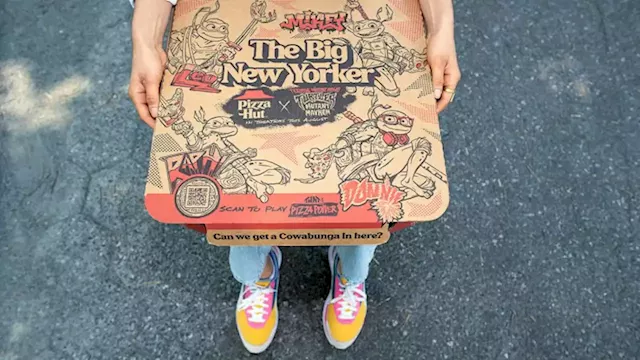 Pizza Hut tests underground deliveries ahead of 'Teenage Mutant Ninja Turtles' movie release | CNN Business