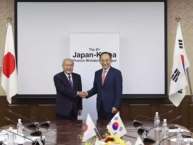 Finance ministers of Japan and South Korea agree to resume currency swap agreement as ties warm