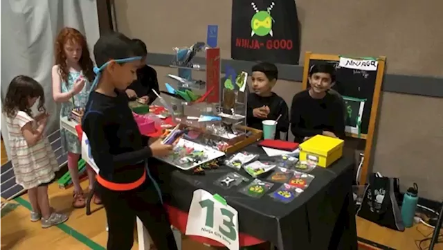 Children learn market economics at Calgary bazaar