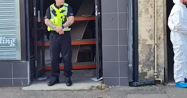 Police raid Scots business as busy high street cordoned off