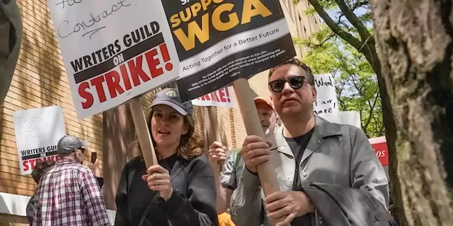 Hollywood actors join screenwriters in historic industry-stopping strike as contract talks collapse