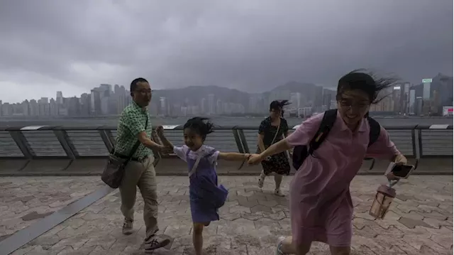 Hong Kong schools and stock market are closed as Typhoon Talim sweeps toward China