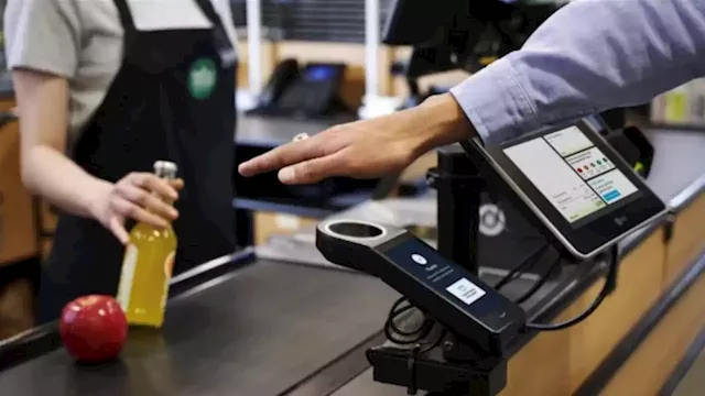 Amazon will let you pay with a wave of your hand at all Whole Foods stores | CNN Business