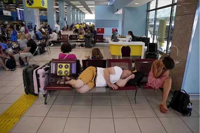 Holiday company and airline staff were conspicuous by their absence at Rhodes airport