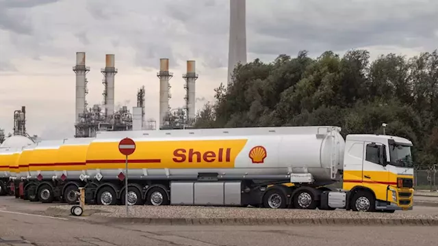 Shell and TotalEnergies profits cut in half by lower oil prices | CNN Business