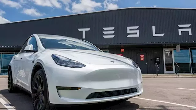 Tesla shares rise on strong sales report | CNN Business