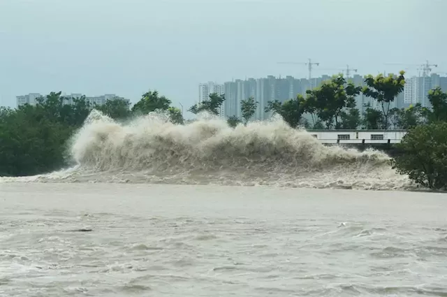 China warns of 'multiple natural disasters' in July | Business