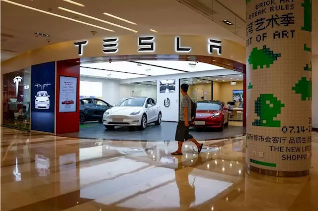 Tesla cuts China prices again, triggering slump in auto stocks