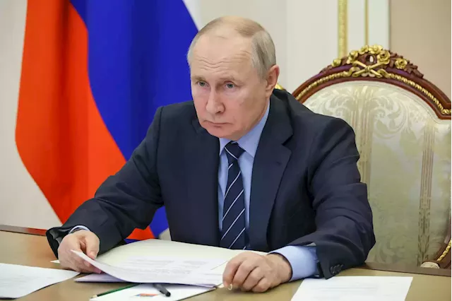 Putin says financial market volatility has hampered investment