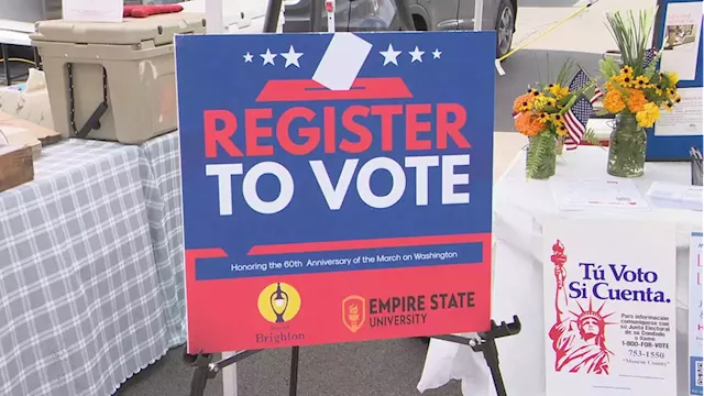 Empire State University encourages voter registration at Brighton Farmer's Market