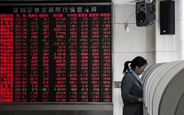 China halves stamp duty on stock trading to boost market