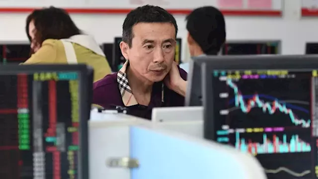 Chinese stocks get brief uplift from first share dealing tax cut since 2008