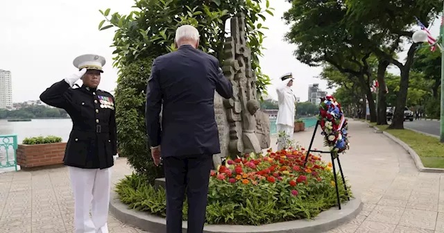 Biden highlights business deals and pays respects at John McCain memorial to wrap up Vietnam visit