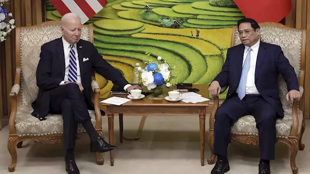 Biden wraps Vietnam visit by talking with business leaders and visiting a memorial to John McCain