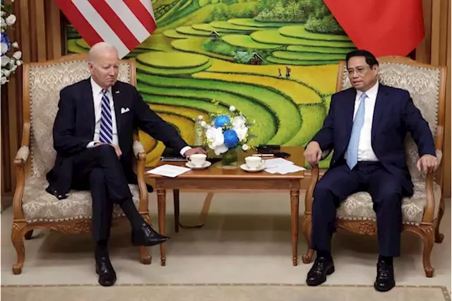 Biden wraps Vietnam visit by talking with business leaders and visiting a memorial to John McCain