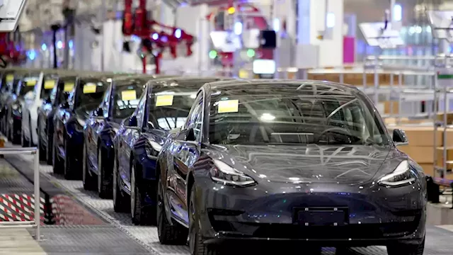 Live: Tesla boosts Nasdaq, US stocks rise ahead of inflation data, Australian dollar holds above 64 US cents