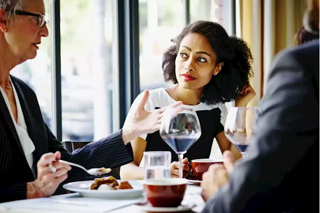 How can I create stricter boundaries around dinner-time business meetings on work trips?