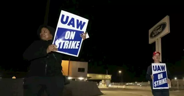 Auto workers strike after deadline for new contract passes: 'We mean business'