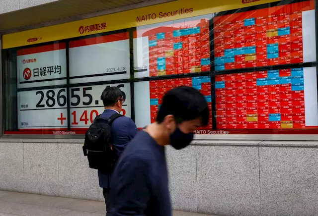 Asia stocks slide amid China woes, Japan catches up on chip sell-off