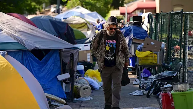 Denver businessman dumps poop found outside his business on city hall steps, demands action on homeless crisis