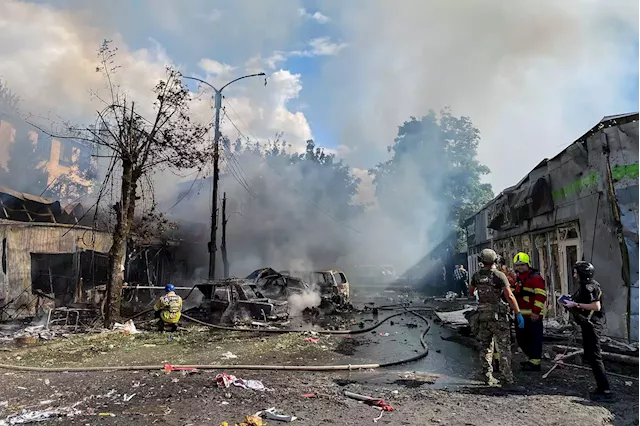 Russian missile turns Ukrainian market into fiery, blackened ruin strewn with bodies