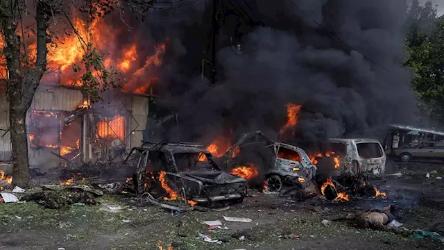 Russian strike on a market in an eastern Ukrainian city kills 16 and wounds dozens, officials say